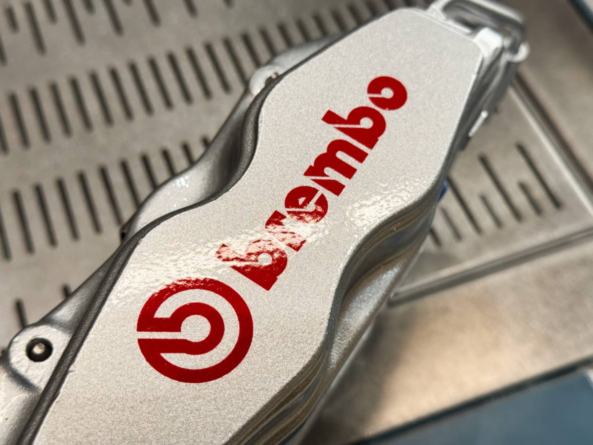 Brembo logo on the body of the rebuilt F50 caliper