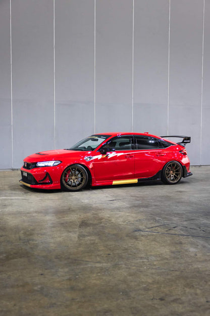 Full side profile of a red FL5 Civic Type R showing the 1950mm side graphic decal across the guard and both doors