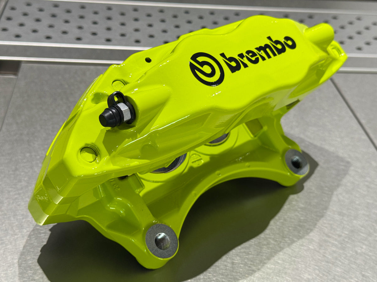 Brembo F50 caliper profile showing the bridge and mounting ears