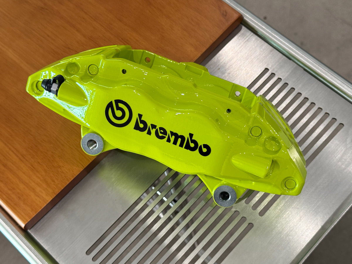 Rebuilt Brembo F50 caliper photographed on a workbench