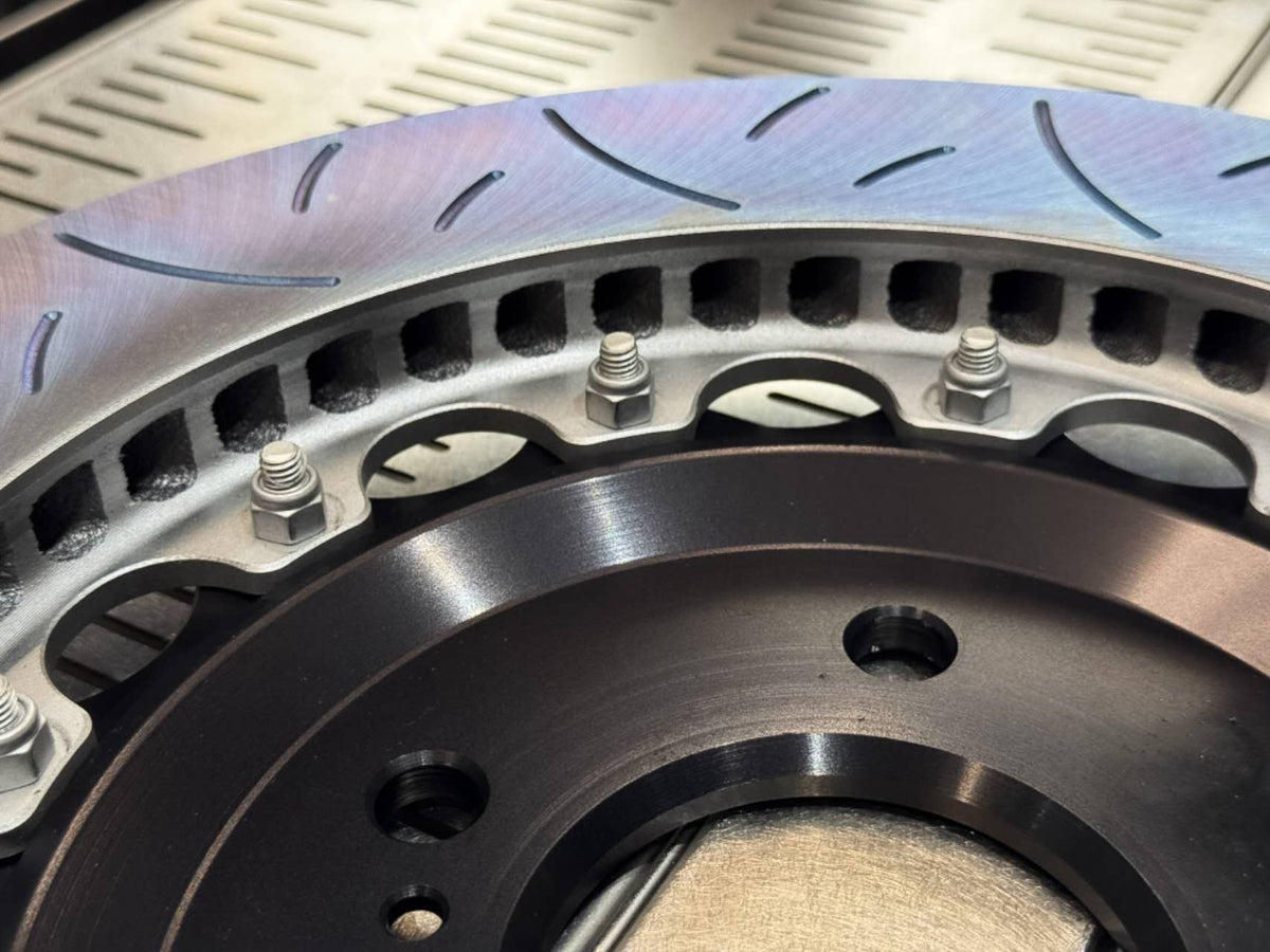 330mm two piece disc showing alloy hat and bolt assembly
