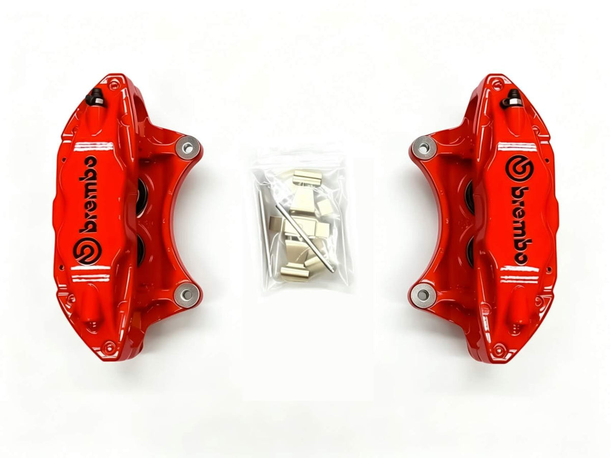 Left and right red Brembo F50 calipers with caliper hardware and pins included