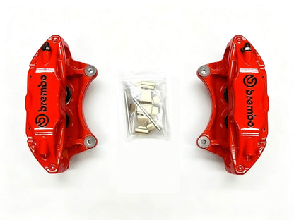 Left and right red Brembo F50 calipers with caliper hardware and pins included