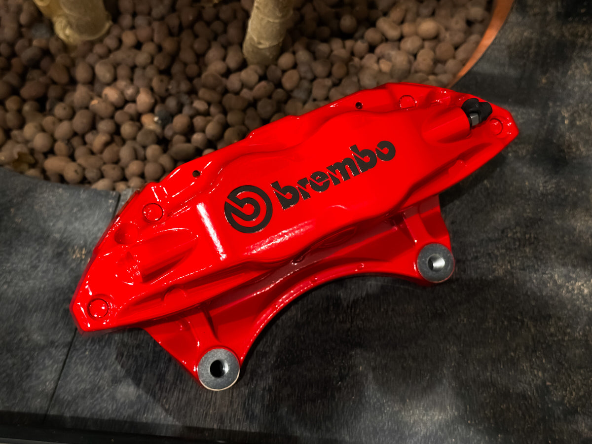 Brembo logo detail on the red caliper body