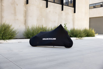 Honda Ruckus Zoomer NPS50 indoor bike cover in black with white RUCKUS lettering, side view