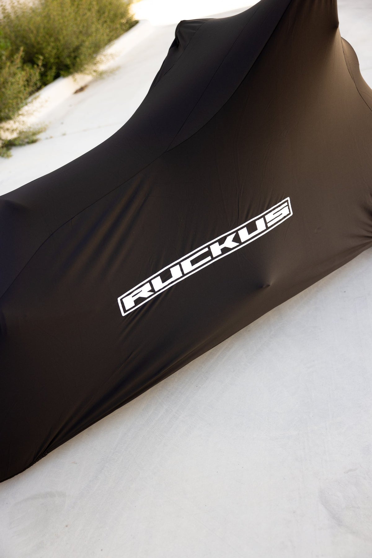 White RUCKUS lettering on the NPS50 indoor bike cover