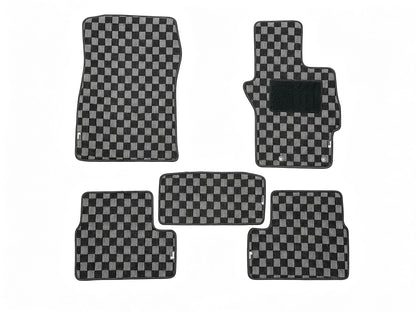 Mitsubishi Lancer Evolution X CZ4A five piece grey and black checker floor mat set laid out