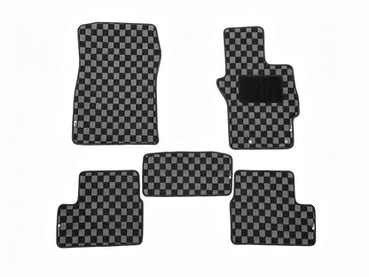 Full CZ4A Evo 10 checker floor mat set showing driver, passenger, rear mats and centre strip